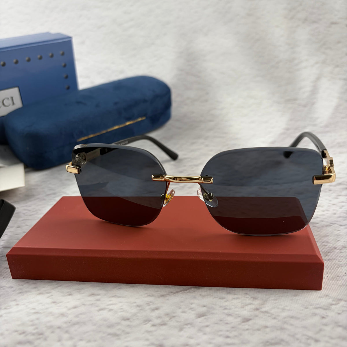 Rimless Rectangular Sunglasses with Gold-Tone Accents & UV Protection